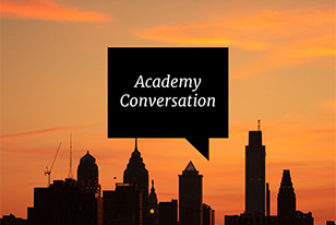 academy conversation, the Philadelphia skyline with an orange sky